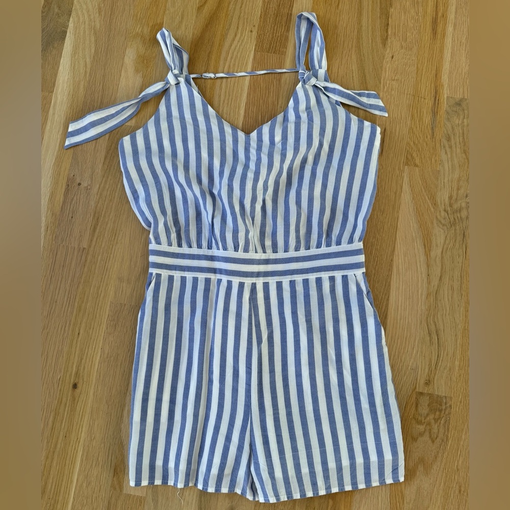 Blue and white sleeveless romper shorts. 100% cotton. Vneck Size Small